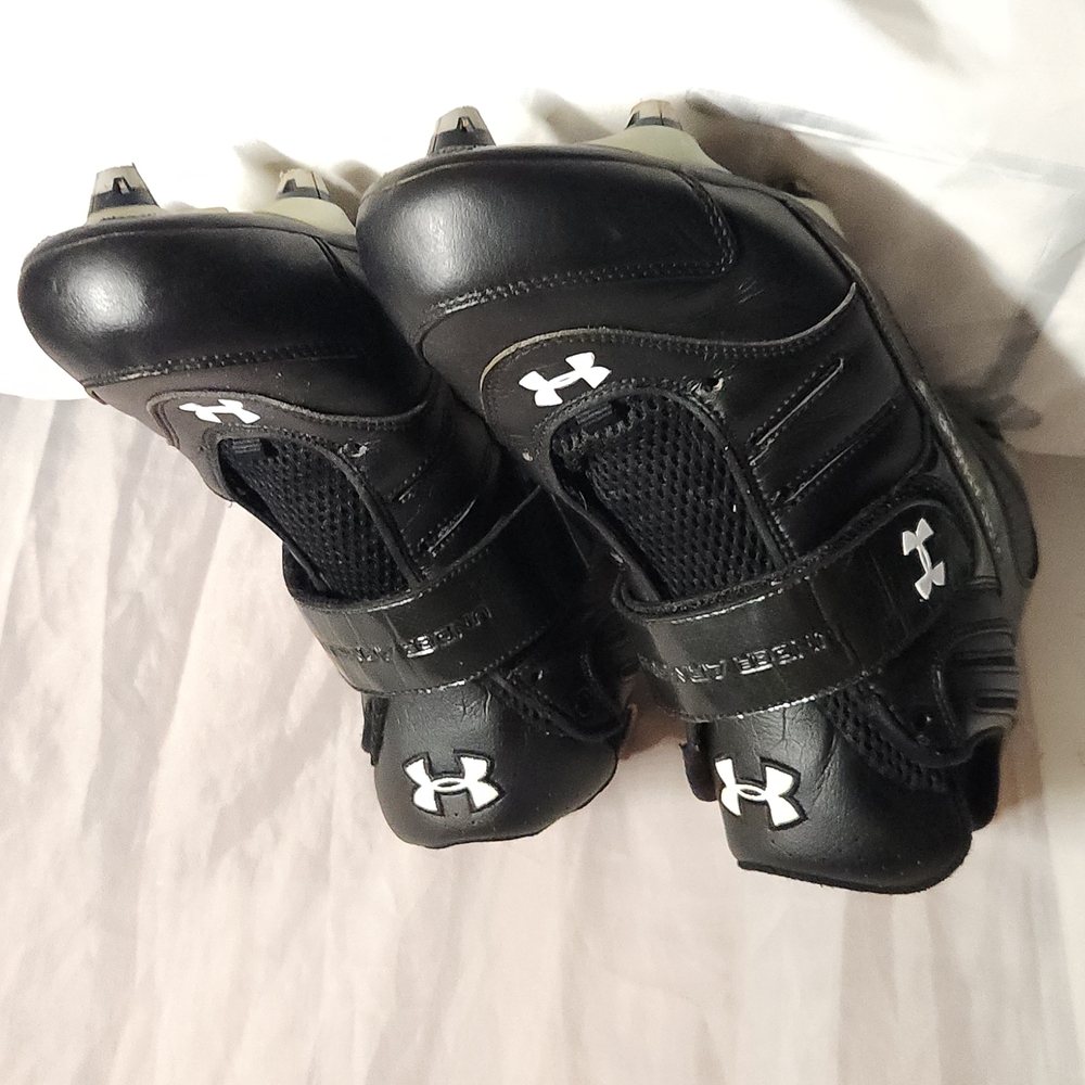 Size 11 under Armour football cleats